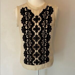 Sleeveless Cream Top with Black Lace Appliqué